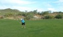 Livingston makes his shot on the first hole