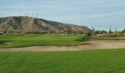 Lots of sand and cactus around this hole