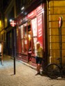 Eloise next to a Swiss restaurant