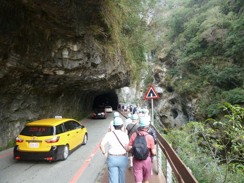 Now we have to walk along the road