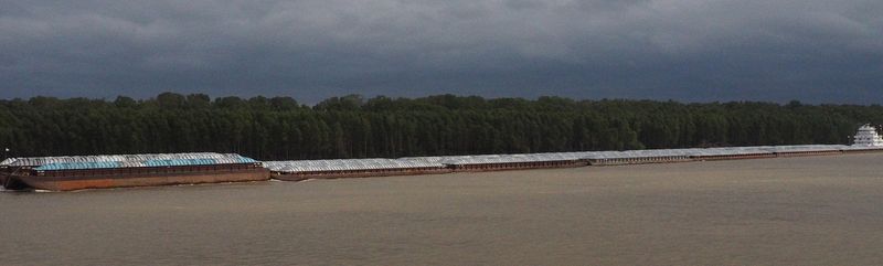 A really long barge on the river