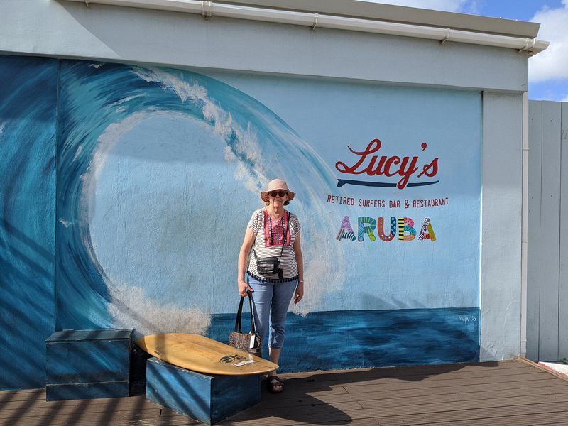 June next to the sign for Lucy's Retired Surfers Bar