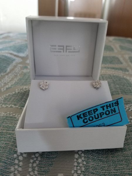 June won these diamond earrings in a raffle