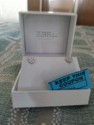 June won these diamond earrings in a raffle