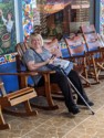 Linda waits for the bus