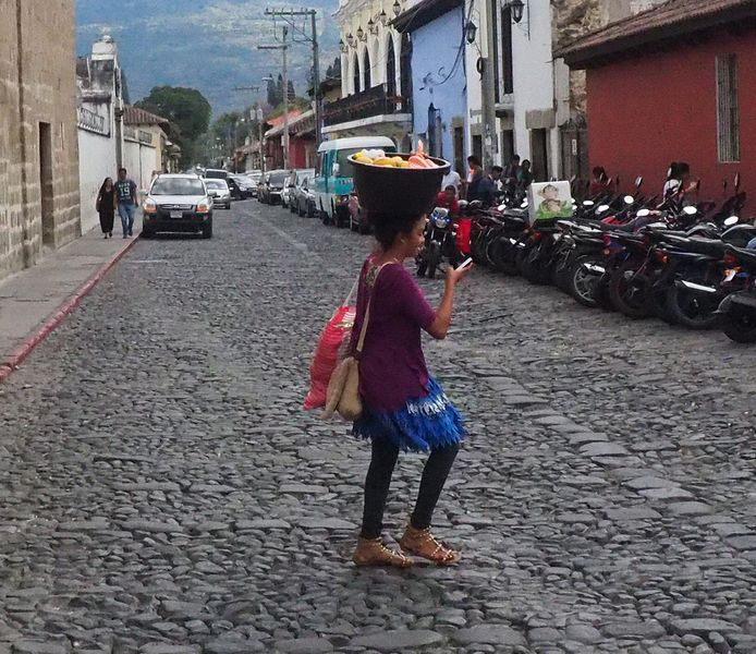 Carrying fruit on her head