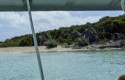 Linda sees thatched huts on her glass bottom boat tour