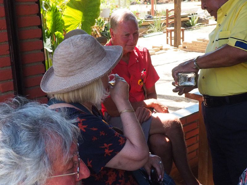 Linda tries a shot of mezcal