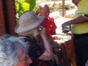 Linda tries a shot of mezcal