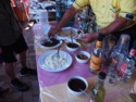 Making a snack of deep fried grasshoppers
