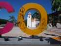Parroquia de Santa Maria Huatulco framed by the letter O