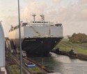 Four locomotives pull the ship next to us as it reaches sea level