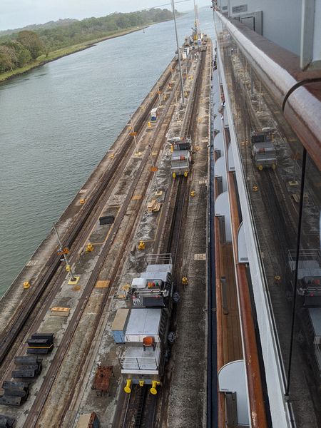 Other locomotives will attach lines at the stern of the ship