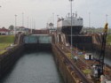 There is a huge cargo ship in the locks next to us