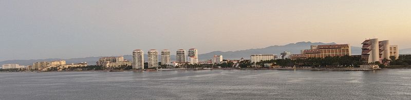 Resort hotels line the shore