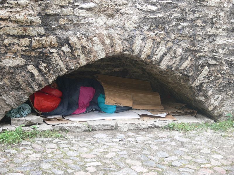 Tallinn's homeless sleep under a Medieval wall