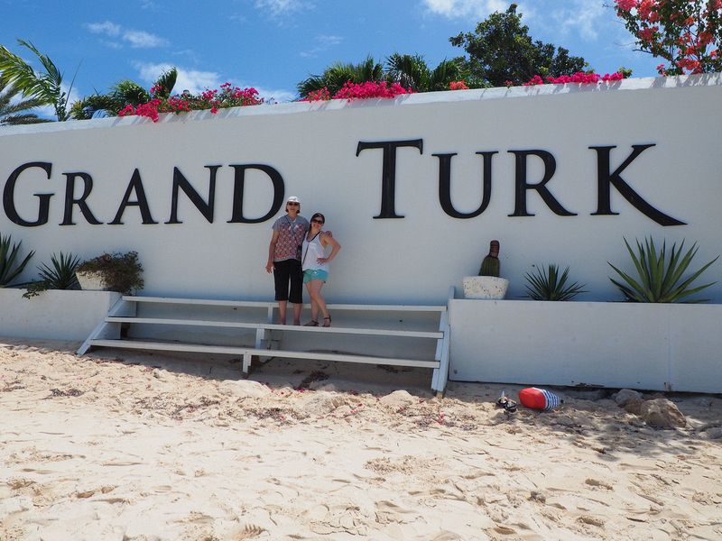 June and Jessica at the Grand Turk sign