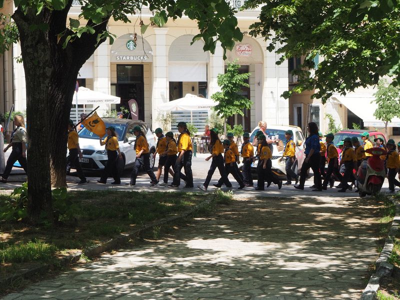 Streaming towards a parade staging area