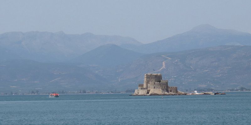 The tenders pass the Bourtzi fortifications