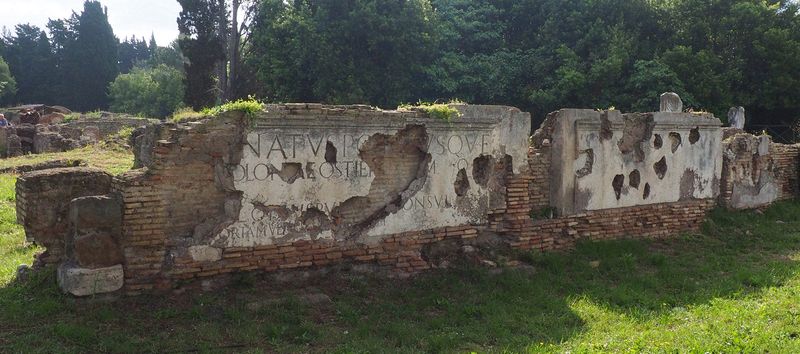 What's left of an entrance sign for the city