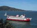 A sightseeing boat goes by