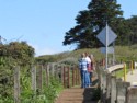 Nicholas, Andrew, and Jessica on a walkway