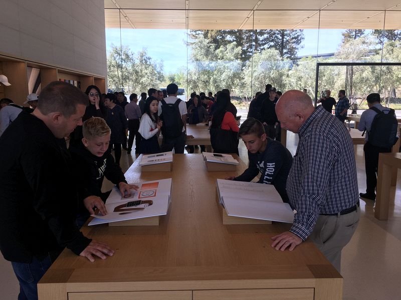 The guys peruse the Apple catalog