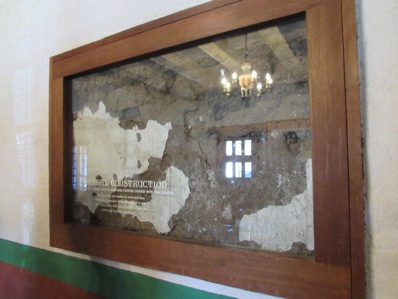 The original adobe brick wall is exposed here