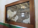 The original adobe brick wall is exposed here