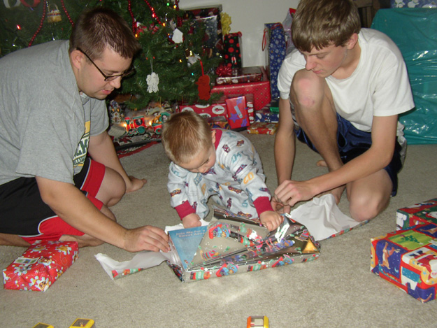 32-Andrew, Eric & Dave opening a present