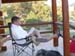 190 dave reading on cabin porch