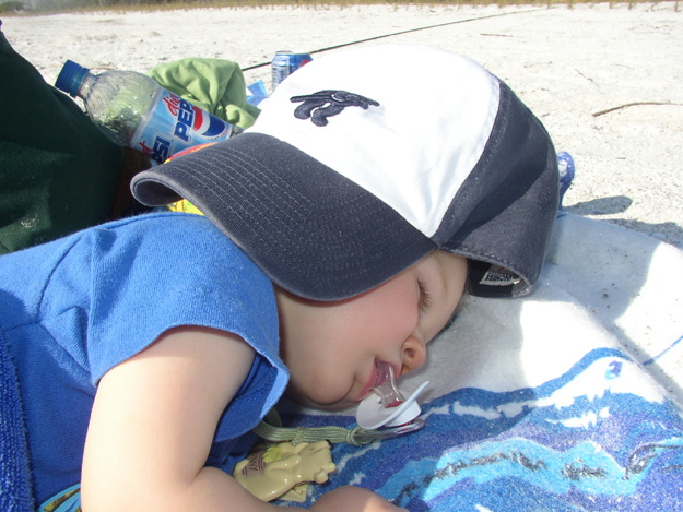 30-Nicholas takes a nap on the beach