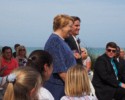 David escorts his Mom to her seat