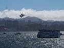 Four Blue Angels in tight formation