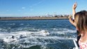 Waving to jet skis in the estuary