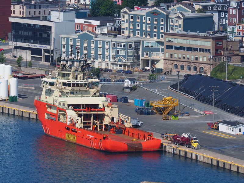 Red fishing boat docked in St John's