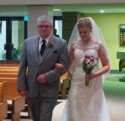 Jeff walks Nicole down the aisle 2