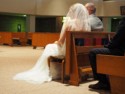 The bride and groom await their vows