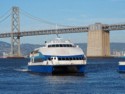 Ferry with Bay Bridge in background