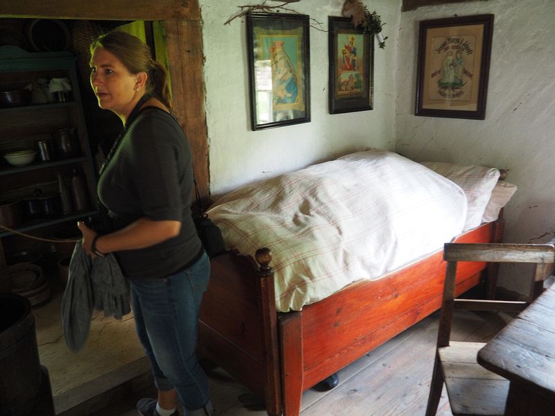 Jen looks through an old house