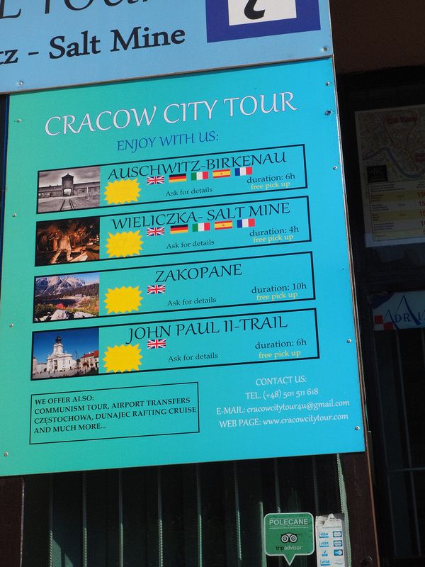 Popular tours at a travel bureau (note the Pop John Paul II tour)