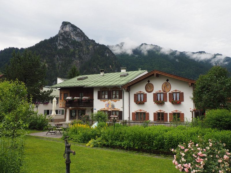 A guesthouse with mountains in the background