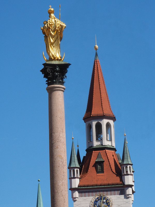 Gold Virgin Mary and the Old City Hall bell tower