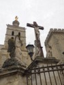 Golden statue of Mary above the cross