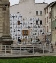 Posters of people holding books