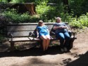 Eloise and Linda recline to look at the tree tops